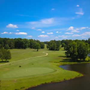 Golf course with pond and trail